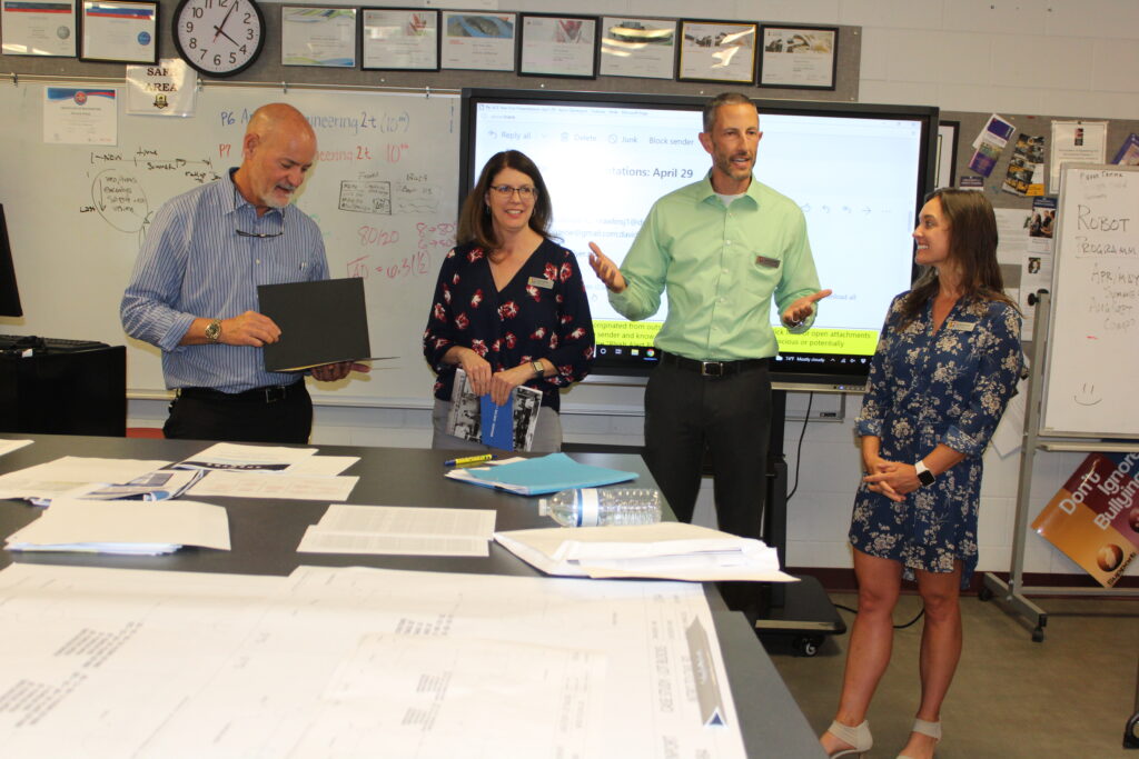 Mr. Kevin Davenport; Judy Deshler, Haskell; Jacob Thurlow, Haskell; Nicole Eubanks, ACE Mentor Program of NEFL