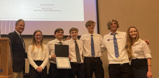 CE board vhair Tom Grogan with Urban Renewal Overall Best Response Winning Team from Pedro Menendez HS