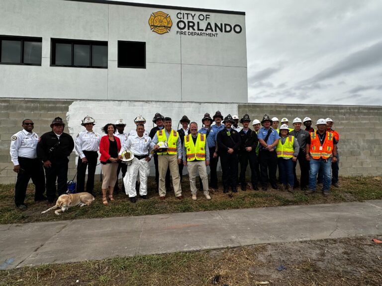 Mayor joins paint crew at Orlando’s new fire station construction site