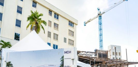 Beam signing ceremony marks major milestone for NCH’s heart and stroke critical care center in Naples